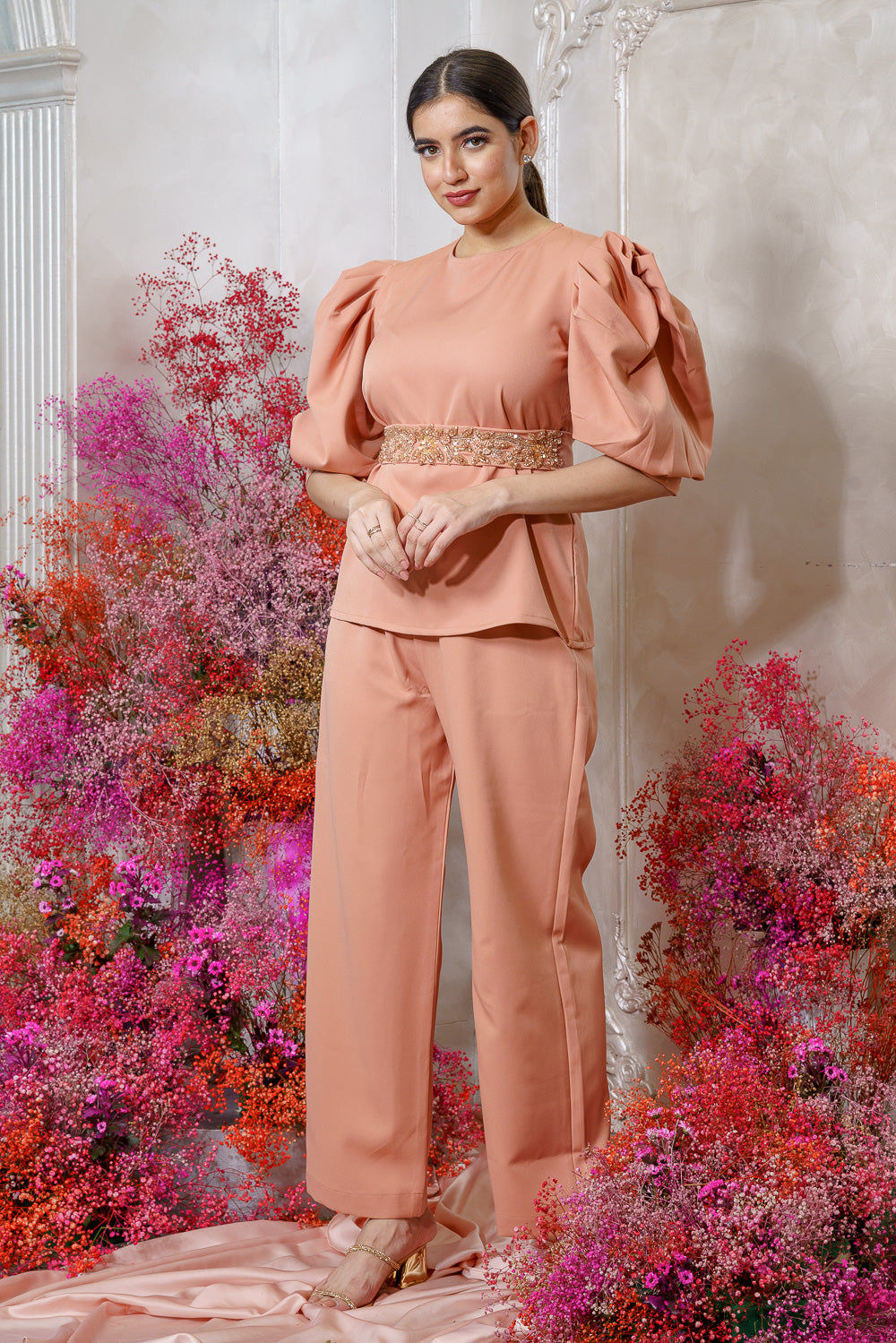 Light Orange Exaggerated Sleeve Top With Embellished belt and a pant