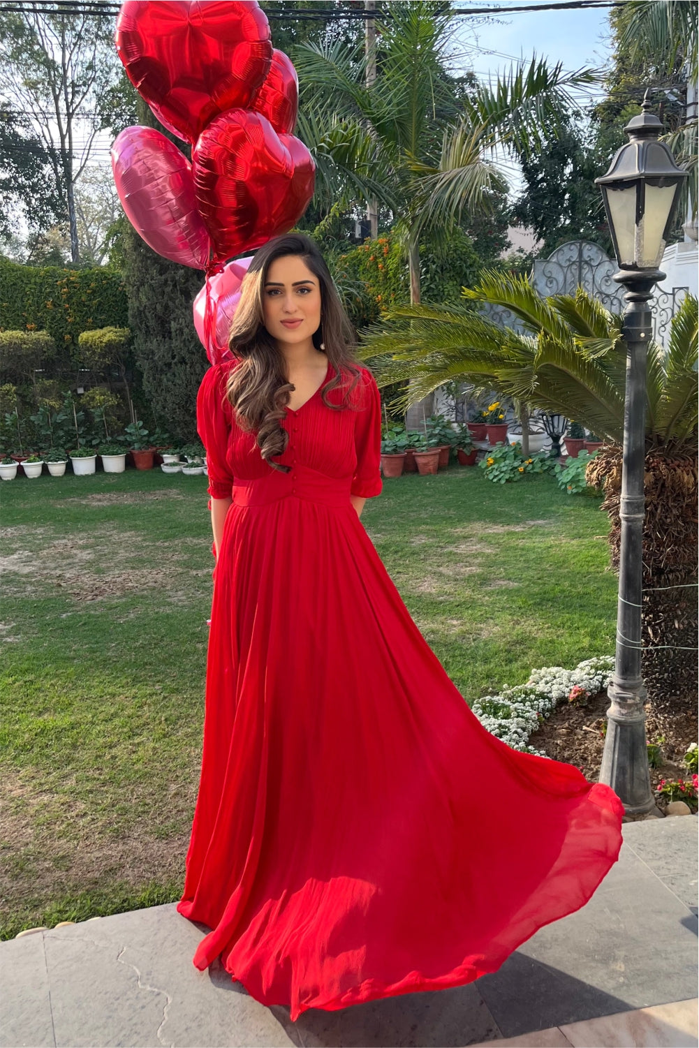 Nikita Vasdev In Red Flared Gown